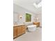 Luxurious bathroom featuring a freestanding tub and large window at 503 Damascus Church Rd, Chapel Hill, NC 27516