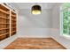 Built-in shelves and hardwood floors feature in this home office at 503 Damascus Church Rd, Chapel Hill, NC 27516