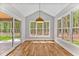 Bright breakfast room with hardwood floors and wooded views at 503 Damascus Church Rd, Chapel Hill, NC 27516