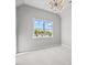 Charming bedroom with a large window and stylish light fixture at 4566 Ashtons Way, Franklinton, NC 27525