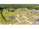 Aerial view of a residential neighborhood with houses and green spaces at 4566 Ashtons Way, Franklinton, NC 27525