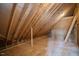 Unfinished bonus room with sloped ceilings and insulation at 4566 Ashtons Way, Franklinton, NC 27525