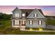 Modern farmhouse style home with stone accents at 4566 Ashtons Way, Franklinton, NC 27525
