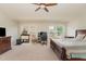 Large main bedroom with high ceilings and wood bed at 1329 Endgame Ct, Wake Forest, NC 27587