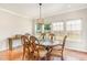 Casual dining area with hardwood floors and large windows at 1329 Endgame Ct, Wake Forest, NC 27587