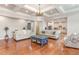 Large living room with hardwood floors and open concept design at 1329 Endgame Ct, Wake Forest, NC 27587