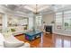Spacious living room with hardwood floors, fireplace, and built-in shelving at 1329 Endgame Ct, Wake Forest, NC 27587
