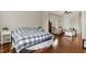 Main bedroom with sitting area, hardwood floors and large windows at 1329 Endgame Ct, Wake Forest, NC 27587