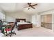 Main bedroom with a desk, TV and access to the hallway at 1329 Endgame Ct, Wake Forest, NC 27587