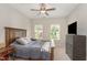 Spacious bedroom with a TV and dresser at 1329 Endgame Ct, Wake Forest, NC 27587