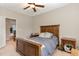 Cozy bedroom with wood bed frame and nightstand at 1329 Endgame Ct, Wake Forest, NC 27587