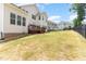 Large backyard with deck and privacy fence at 1329 Endgame Ct, Wake Forest, NC 27587