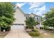 Two-story house with driveway and landscaping at 1329 Endgame Ct, Wake Forest, NC 27587