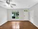 Living room featuring hardwood floors and backyard access at 320 Gilman Ln # 110, Raleigh, NC 27610