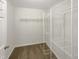 Walk-in closet with wire shelving and hanging rods at 320 Gilman Ln # 110, Raleigh, NC 27610