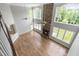 Spacious living room with hardwood floors and stone fireplace at 11603 Broadfield Ct, Raleigh, NC 27617