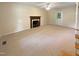 Spacious living room featuring a fireplace and carpet flooring at 6309 Lost Acorn Way, Willow Springs, NC 27592