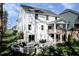 Two-story house with a large deck and patio, perfect for outdoor entertaining at 8805 Tartan Clan Dr, Willow Springs, NC 27592
