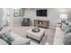 Finished basement with sectional sofa, ottoman, and adjacent bathroom at 8805 Tartan Clan Dr, Willow Springs, NC 27592