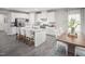 Spacious kitchen featuring granite countertops and stainless steel appliances at 8805 Tartan Clan Dr, Willow Springs, NC 27592
