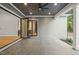 Covered patio with stone flooring and access to the house and backyard at 111 November Dr, Durham, NC 27712