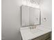Modern bathroom with a vanity, mirror, and updated fixtures at 111 November Dr, Durham, NC 27712