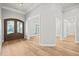 Grand entryway with hardwood floors and double doors at 111 November Dr, Durham, NC 27712