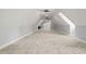 Spacious bonus room with high ceilings and two ceiling fans at 111 November Dr, Durham, NC 27712