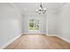 Elegant dining room with hardwood floors and large window providing natural light at 111 November Dr, Durham, NC 27712