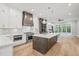 Open kitchen with large island and stainless steel appliances at 111 November Dr, Durham, NC 27712