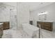 Elegant bathroom with marble finishes, freestanding tub and walk-in shower at 111 November Dr, Durham, NC 27712
