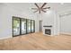 Living room with hardwood floors, fireplace, and sliding glass doors at 111 November Dr, Durham, NC 27712