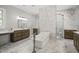 Luxurious bathroom with marble flooring, soaking tub, and walk-in shower at 111 November Dr, Durham, NC 27712