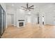 Bright living room with hardwood floors and fireplace at 111 November Dr, Durham, NC 27712