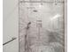 Large shower with gray tile, glass enclosure, and rainfall shower head at 111 November Dr, Durham, NC 27712