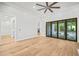 Bright living room with hardwood floors, access to backyard and fireplace at 111 November Dr, Durham, NC 27712