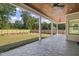 Covered patio with stamped concrete and view of backyard at 109 November Dr, Durham, NC 27712