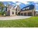 Brick house with three car garage and landscaped lawn at 109 November Dr, Durham, NC 27712