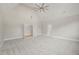 Large bedroom with vaulted ceiling, carpet, and access to other rooms at 109 November Dr, Durham, NC 27712