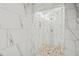 Spacious shower with marble-look tile and a unique accent strip at 109 November Dr, Durham, NC 27712