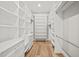 Spacious walk-in closet with ample shelving and hanging space at 109 November Dr, Durham, NC 27712
