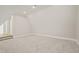 Large bedroom with sloped ceilings and grey carpet at 109 November Dr, Durham, NC 27712