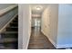 Entryway with view of stairs and living area at 1112 Snow Peak Ct, Raleigh, NC 27603