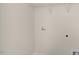Laundry room with shelving and hookups for washer and dryer at 863 Old Tarboro Rd, Wendell, NC 27591