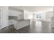 Modern kitchen features a granite island and white cabinets at 863 Old Tarboro Rd, Wendell, NC 27591