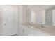 Modern bathroom with double vanity and a shower/tub combo at 859 Old Tarboro Rd, Wendell, NC 27591