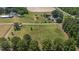 Aerial view of property showing large land and a road at 113 Amelia Ln, Holly Springs, NC 27540