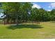 Horse property featuring a round pen with metal fencing at 113 Amelia Ln, Holly Springs, NC 27540