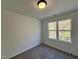 Spacious bedroom with large window and carpet at 85 Shenandoah Ct, Clayton, NC 27520