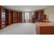 Home office with built-in bookshelves and desk at 2674 Stanton Hill Rd, Cameron, NC 28326